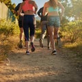 Workout pals give you the boost you need. a fitness group out running.