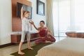 Workout. Parent And Kid Stretching At Home. Happy Mother And Daughter Exercising Together In Living Room. Royalty Free Stock Photo