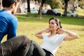 Workout with personal trainer in the park Royalty Free Stock Photo