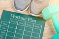 Workout plan on green board. Royalty Free Stock Photo