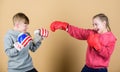 Workout of small girl and boy boxer in sportswear. Happy children in boxing gloves. Fitness diet. punching knockout