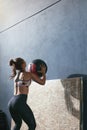 Workout. Sport Woman Training With Crossfit Ball At Gym