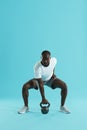 Workout. Sports man doing kettlebell exercise training Royalty Free Stock Photo