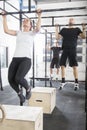 Workout team trains pullups at fitness gym Royalty Free Stock Photo