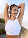 Workout woman, headphones music and fitness after a exercise training, run or health sport outdoor. Happy smile of a Royalty Free Stock Photo