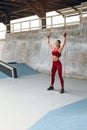 Workout. Woman With Resistance Band Doing Stretching Exercise At Outdoor Stadium. Fitness Girl In Fashion Sportswear. Royalty Free Stock Photo