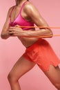 Workout. Woman Training With Resistance Bands On Pink Background Royalty Free Stock Photo