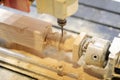 Workpiece processing on wood turning lathe machine Royalty Free Stock Photo