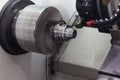 Close up workpiece clamp in chucks of a lathe machine