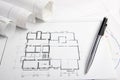 Workplace of architect - Architectural project, blueprints, rolls and tablet, pen, divider compass on plans. Engineering Royalty Free Stock Photo