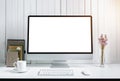 Workplace background with Blank white screen modern desktop comp