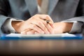 Workplace closeup person professional businesswoman sitting at desk hold pen signing or signature contract paper. Employee woman Royalty Free Stock Photo