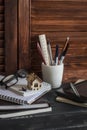 Workplace designer and architect with business objects - books, notebooks, pens, pencils, rulers, tablet, glasses and a model of a Royalty Free Stock Photo