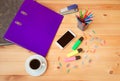 Workplace with folders, smartphone, coffee cup and office supplies Royalty Free Stock Photo