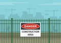 Workplace golden safety rules and tips. Construction area warning sign on a green fence. Royalty Free Stock Photo