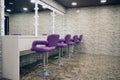 Workplace makeup artist. Barbershop. Nobody. Big mirrors and purple leather chairs Royalty Free Stock Photo