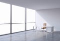 A workplace in a modern corner panoramic office, copy space on windows. A brown leather chair and a white table.