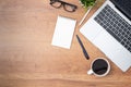 Workplace of office desk wooden table with laptop, and equipment other office supplies Royalty Free Stock Photo