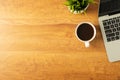 Workplace of office desk wooden table with laptop, and equipment other office supplies Royalty Free Stock Photo