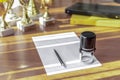 Workplace office space with a blank sheet, pen, stamp, folders and trophies. Sport business concept. Selective focus Royalty Free Stock Photo