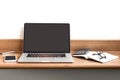 Workplace with open laptop with black screen on modern wooden de Royalty Free Stock Photo
