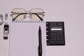 Workplace with pen, paper, glasses, and stationery. Top view. Copying the background of the space. Flat lay. Royalty Free Stock Photo