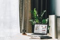 Workplace without people, close-up of laptop with graphs, charts, diagrams on screen on white table, desk. Royalty Free Stock Photo