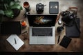 Workplace of photographer with laptop, camera and accessories on wooden table, Flat lay of photographer\'s desk with laptop Royalty Free Stock Photo