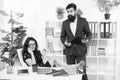 Workplace relations. Business professionals at workplace. Working couple solve workplace problem. Bearded man and sexy