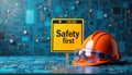 Workplace safety sign, orange hard hat, safety goggles placed on circuit board tech background. Safety first. High tech industry, Royalty Free Stock Photo