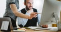 Workplace teamwork concept, colleague discuss startup project. Bearded young businessman working at office. Director man thinking Royalty Free Stock Photo