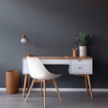 Workplace with white chair at wooden drawer writing desk against of window near dark grey wall Interior of home office Royalty Free Stock Photo