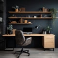 Workplace with wooden desk and black chair against of black wall with shelving unit. Interior of modern Scandinavian home office