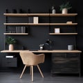 Workplace with wooden desk and black chair against of black wall with shelving unit. Interior of modern Scandinavian home office