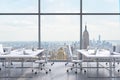 Workplaces In A Modern Panoramic Office, New York City View From The Windows. A Concept Of Financial Consulting Services.