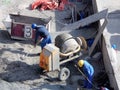 Builder worker mixing cement