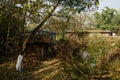 Worksheds by pond in woods at sunny winter noon Royalty Free Stock Photo