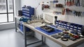 Workshop interior featuring a well organized workstation with metal tables Royalty Free Stock Photo