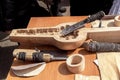 Workshop for the manufacture of Kazakh folk musical instruments. Wood carving.