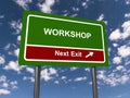 workshop next exit traffic sign on blue sky Royalty Free Stock Photo