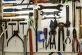 Workshop scene. Old tools shelf against a table and wall