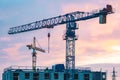 Worksite with cranes, new buildings or houses under construction Royalty Free Stock Photo