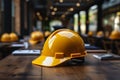 Worksite readiness Construction workers yellow helmet presented on a table