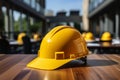 Worksite readiness Construction workers yellow helmet presented on a table Royalty Free Stock Photo