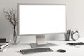 Workspace with blank computer monitor white screen Royalty Free Stock Photo