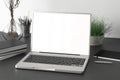Workspace with blank laptop monitor Royalty Free Stock Photo