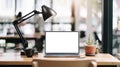 Workspace blank screen Computer and equipment on table and blurred background