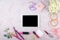 Workspace with computer, bouquet Hydrangeas, clipboard. Women`s fashion accessories isolated on pink background. Flat Royalty Free Stock Photo