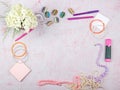 Workspace with computer, bouquet Hydrangeas, clipboard. Women`s fashion accessories isolated on pink background. Flat Royalty Free Stock Photo