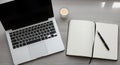 A workspace features a laptop with Royalty Free Stock Photo